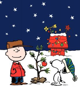 Charlie Brown and Snoopy looking at the small Charlie Brown Christmas Tree.